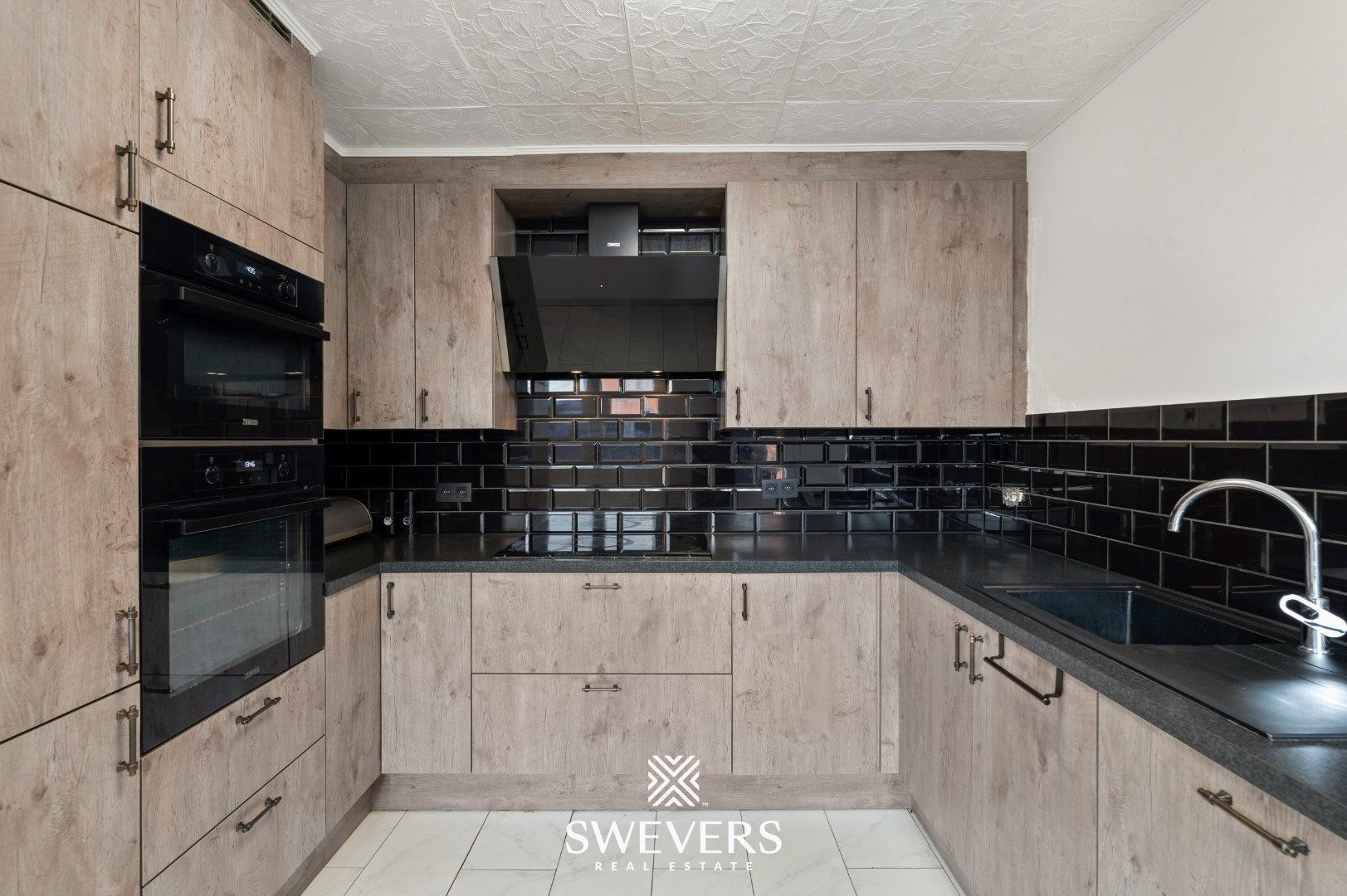 Charmante woning met Handelspand te Leopoldsburg foto 7