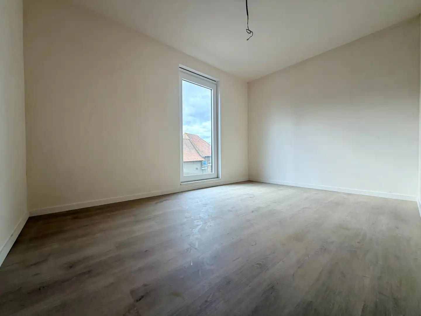 Uitzonderlijk ruime halfopen woning! foto 14