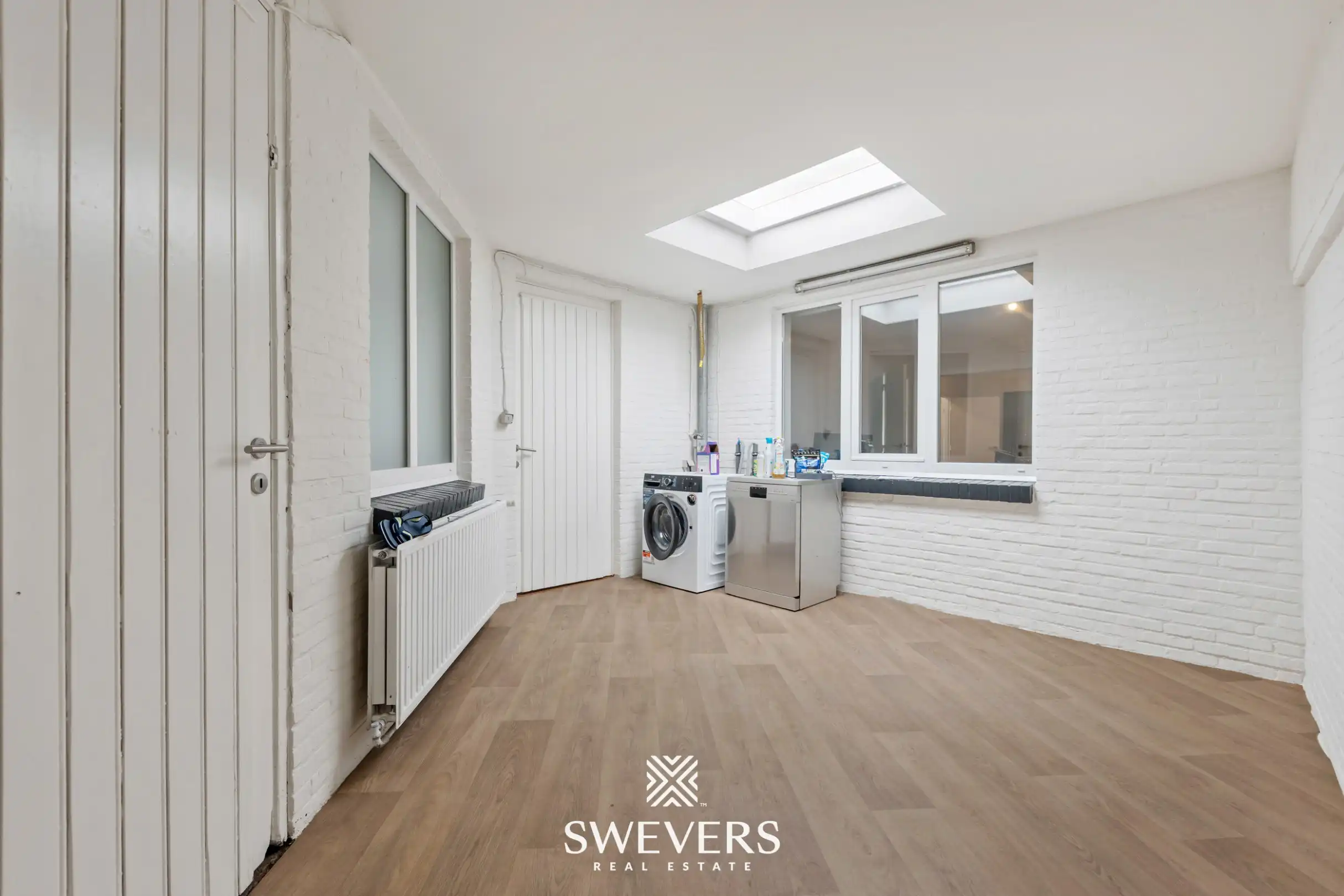 Te renoveren woning met 4 slaapkamers en 4 garages te Beringen foto 18