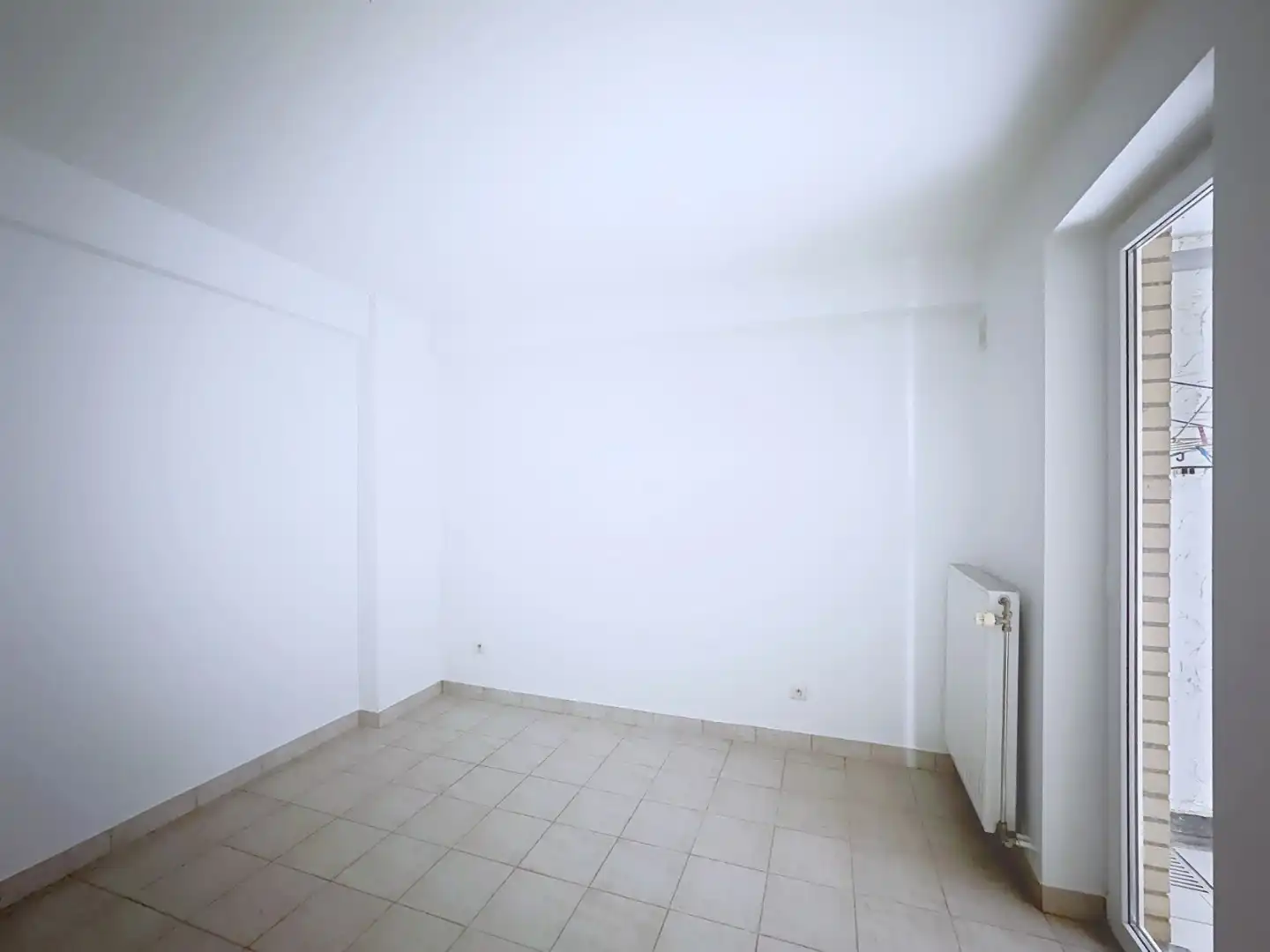 Centraal gelegen gelijkvloers-appartement met 1 grote slaapkamer foto 7