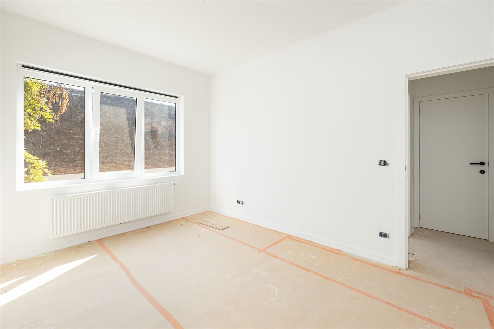 Ruim en licht 2-slaapkamerappartement met dakterras foto 20