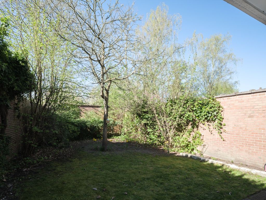 Instapklaar 2-slpk appartement met een ruime, private tuin foto 3