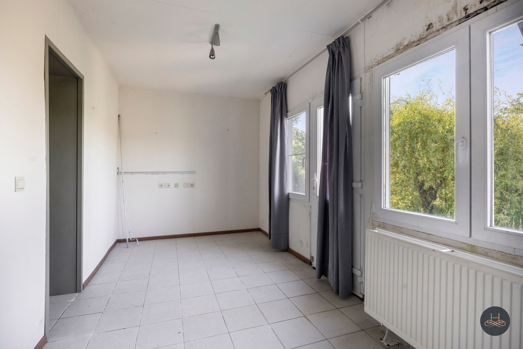 Op te knappen woning met uitzicht op de Dijle te Rotselaar foto 8