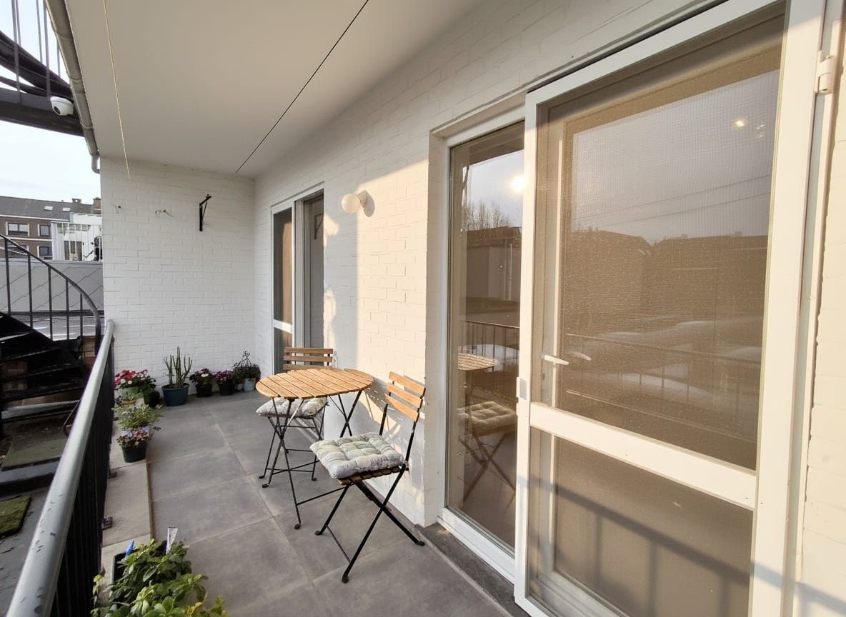 GERENOVEERD APPARTEMENT MET 2 SLAAPKAMERS, GARAGE EN TERRAS IN HET CENTRUM VAN EINZE foto 7