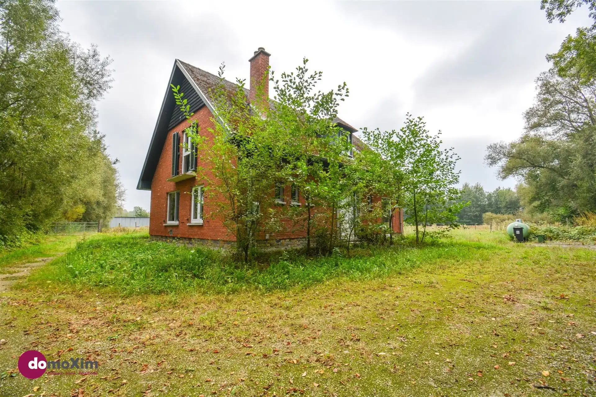 Achterin gelegen woning met 3 slaapkamers in Boortmeerbeek foto {{pictureIndex}}