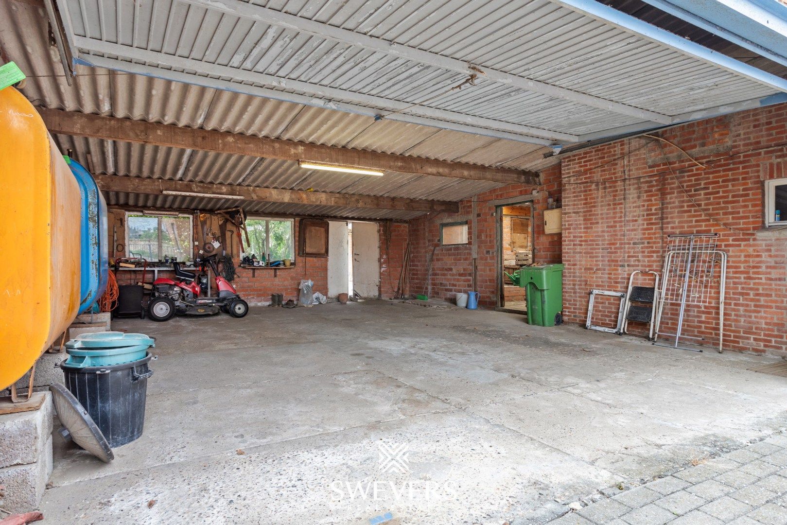 Te renoveren woning met grote tuin in hartje Wellen foto 30