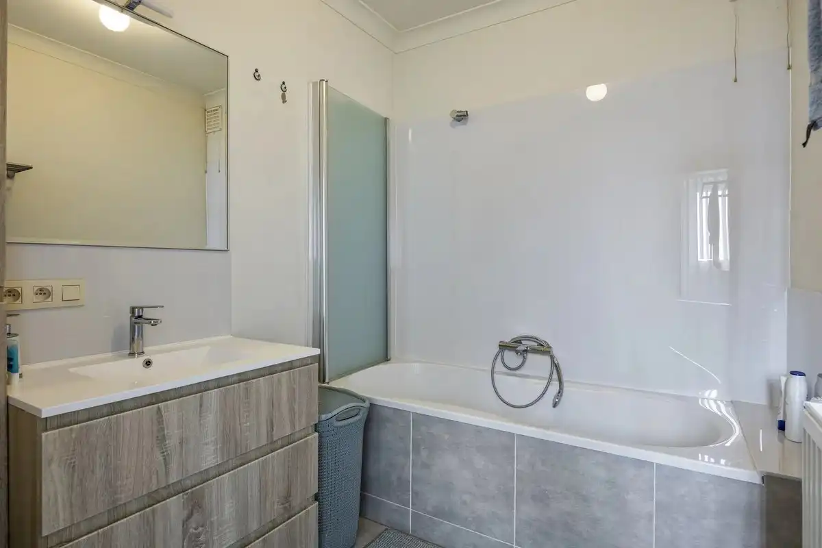 OPBRENGSTEIGENDOM BESTAANDE UIT TWEE RUIME EN VERHUURDE APPARTEMENTEN IN HERK-DE-STAD foto 31