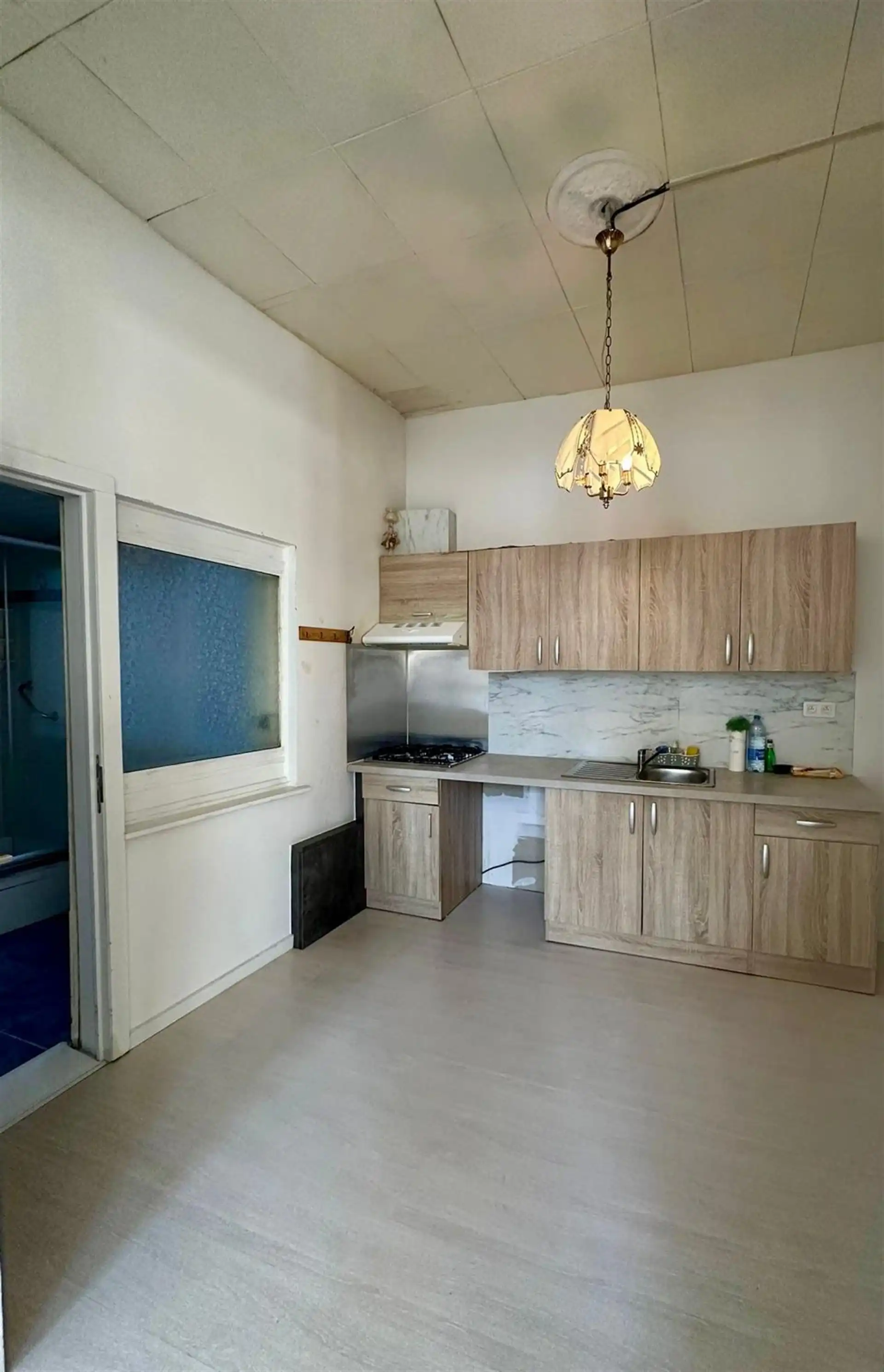 Te renoveren woning met veel potentieel in Berchem!  foto 10