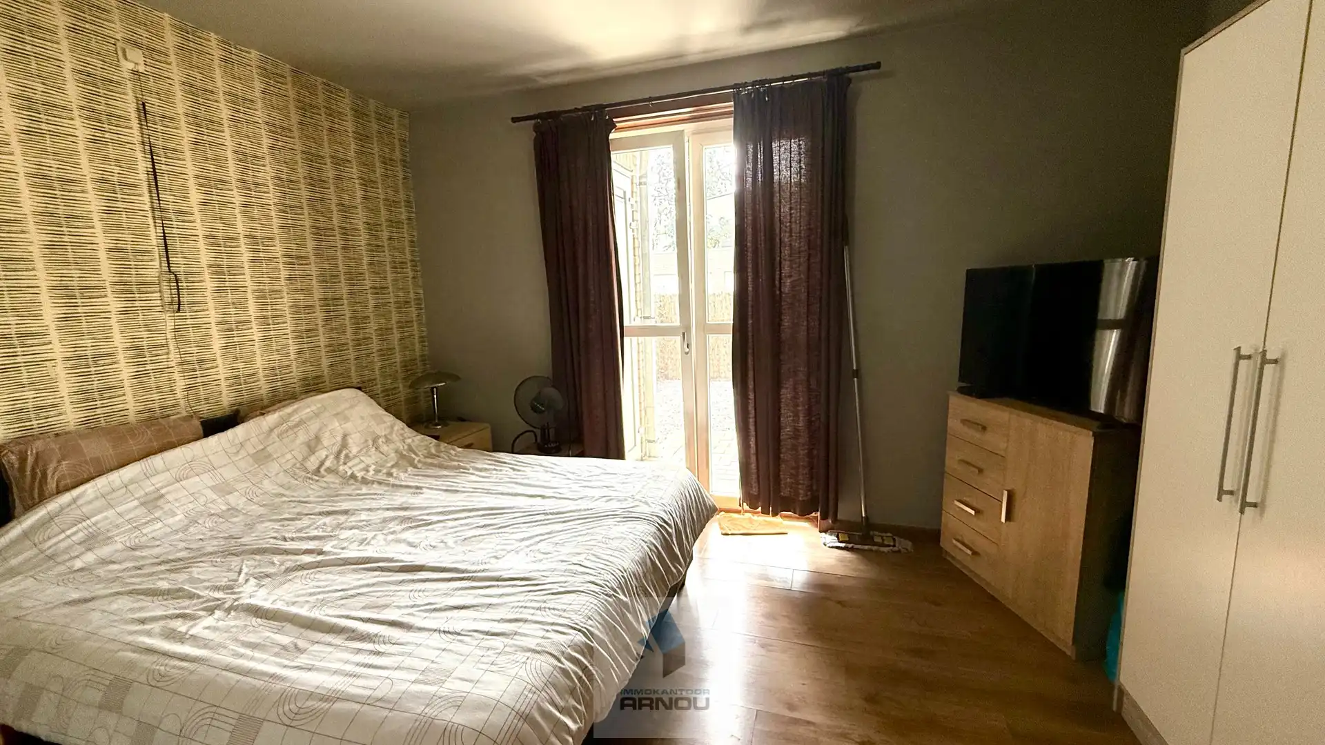 Gezellig gelijkvloers appartement met 1 slaapkamer, stadstuintje en privatieve autostaanplaats foto 9