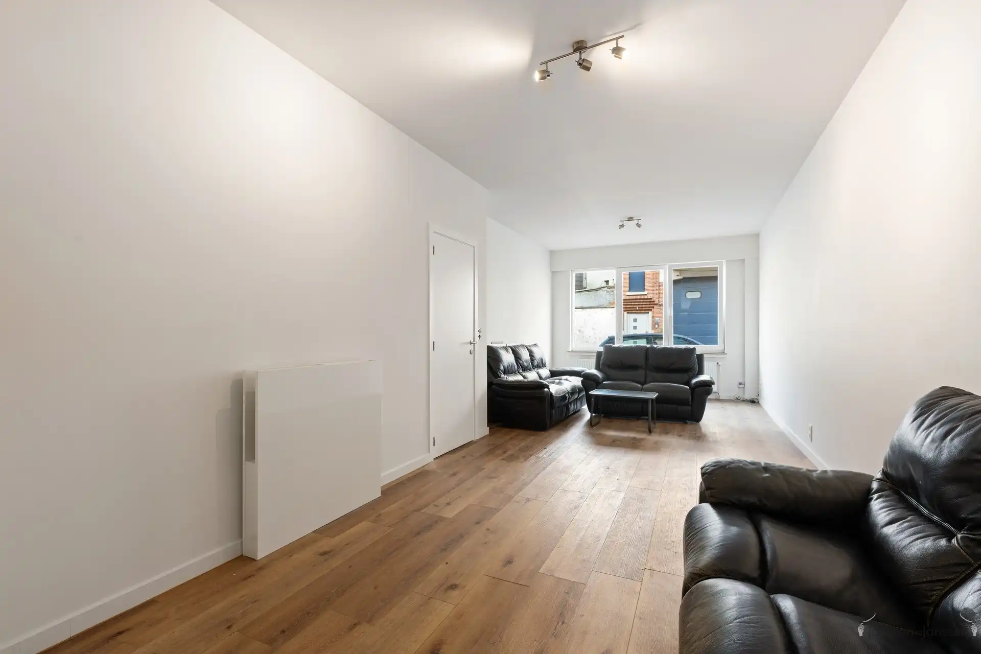 Gelijkvloersappartement met 120 m² tuin en 2 slaapkamers op de grens van Schoten en Merksem foto 4