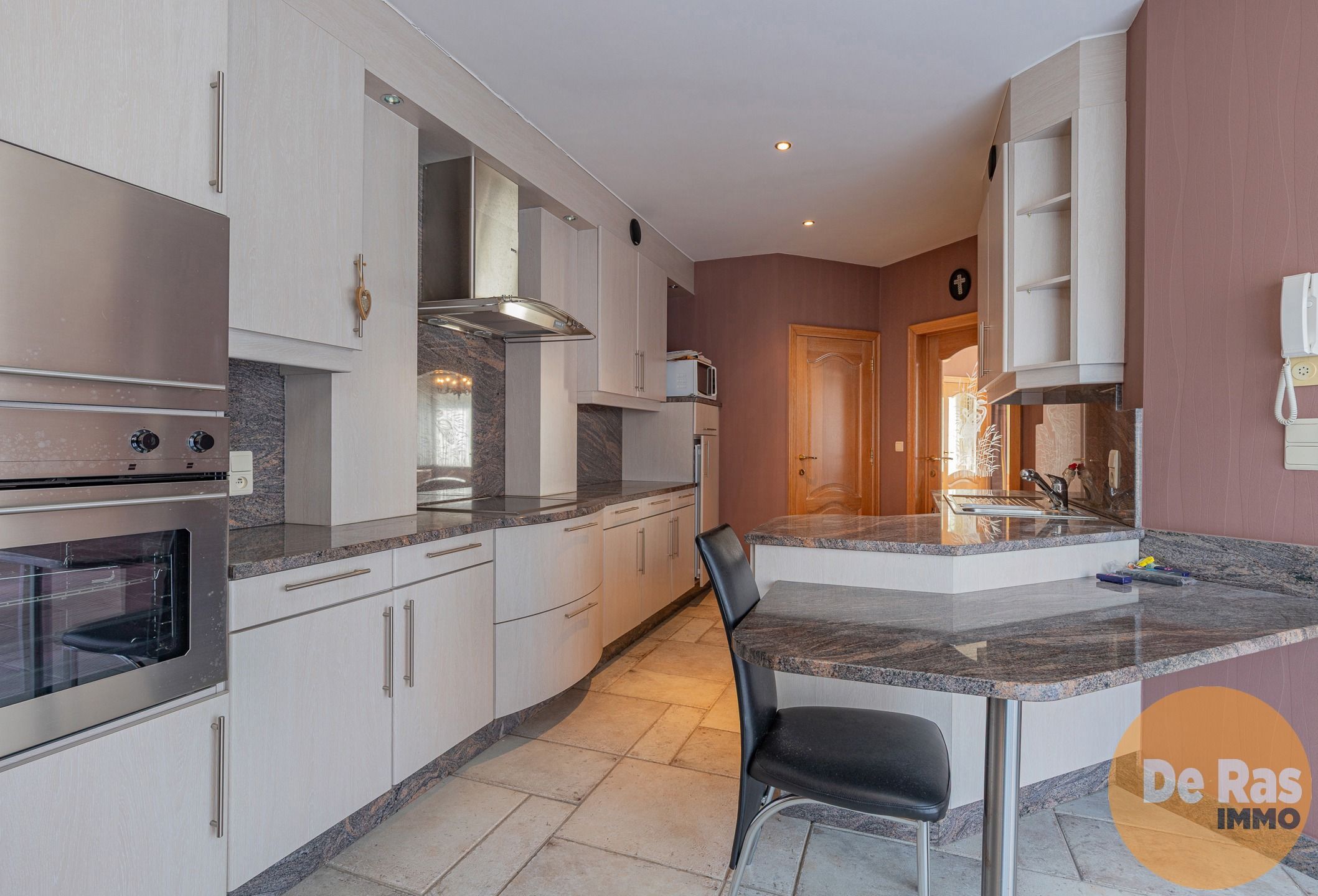 NIEUWERKERKEN - Kwalitatieve woning met diepe tuin en garage foto 7
