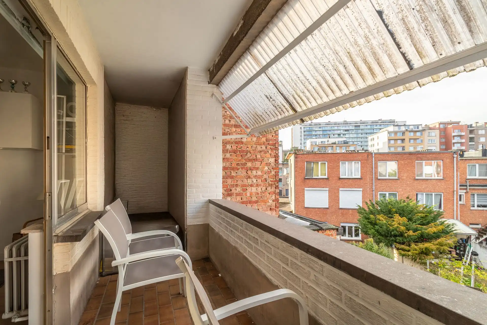 Een exclusief ruim duplex appartement met tuin en garagebox foto 18