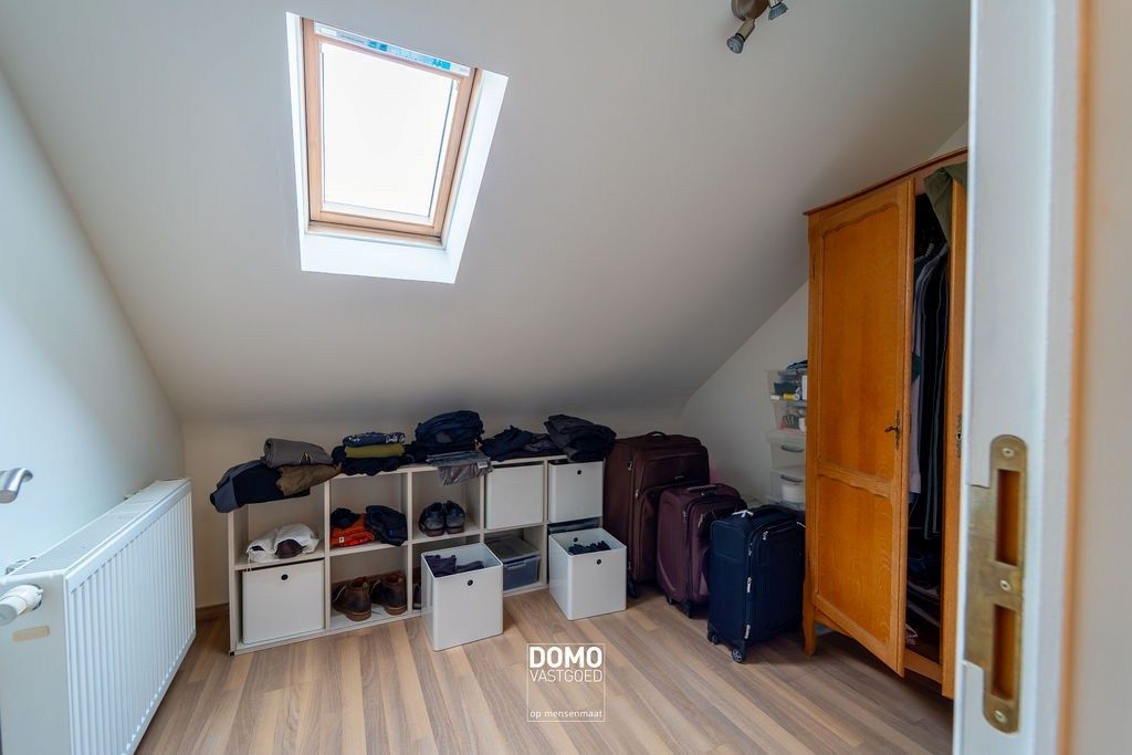 INSTAPKLAAR DUPLEXAPPARTEMENT MET TERRAS EN AUTOSTANDPLAATS IN HEUSDEN-ZOLDER foto 11