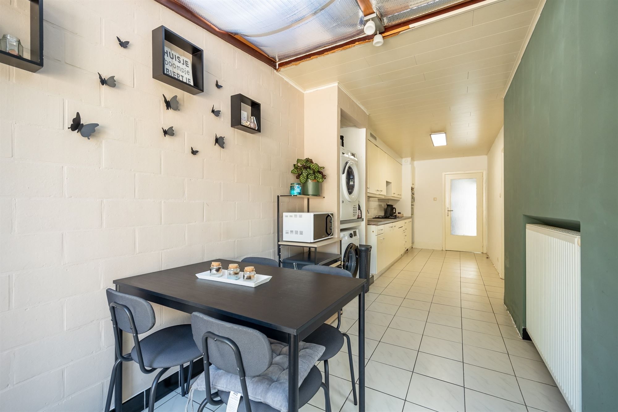 Gelijkvloersappartement met stadskoer en garagebox foto 18