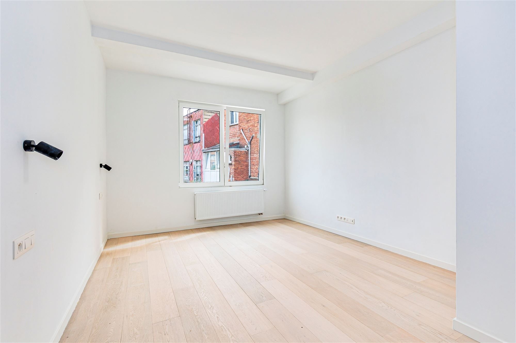 Gelijkvloers duplexappt met 3 slk + tuin foto 9