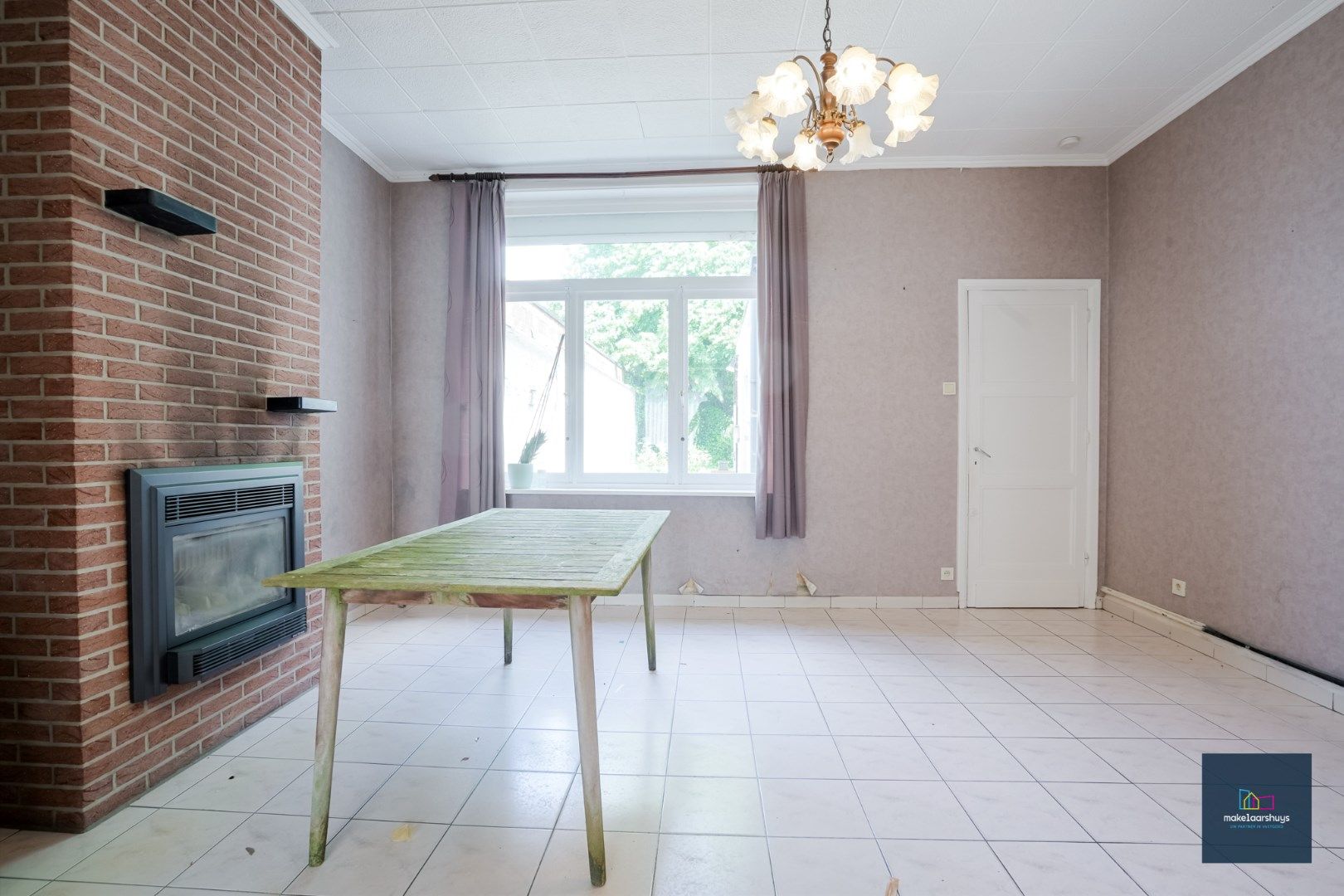 Centraal gelegen te renoveren woning in rij met tuin te Mariakerke foto 7