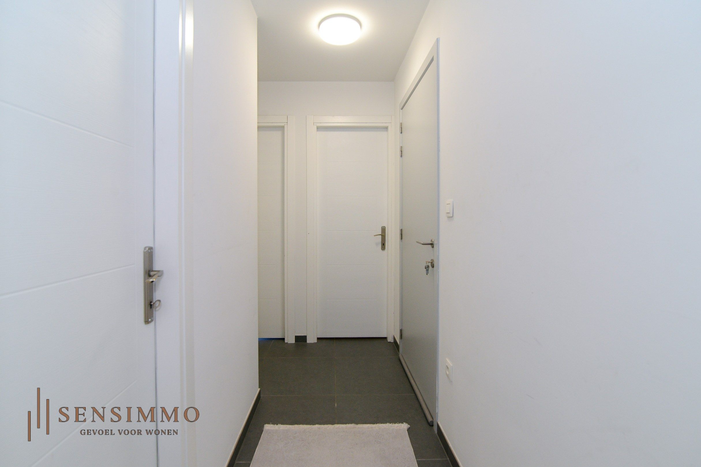 Tweeslaapkamer appartement met dubbel terras, parking en kelderberging foto 4