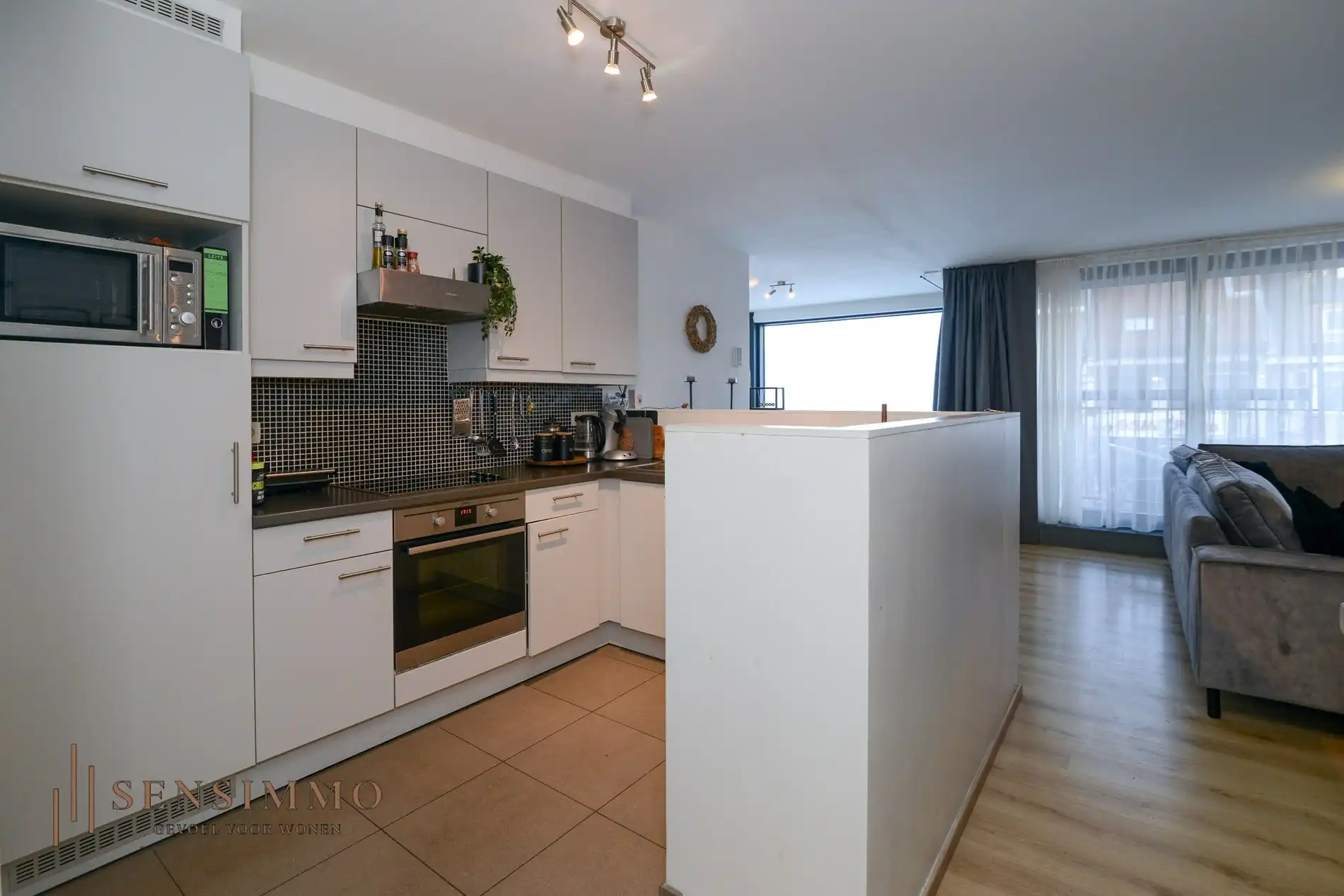 Instapklaar 2-slaapkamerappartement met dubbele terras in hartje Eisden foto 9