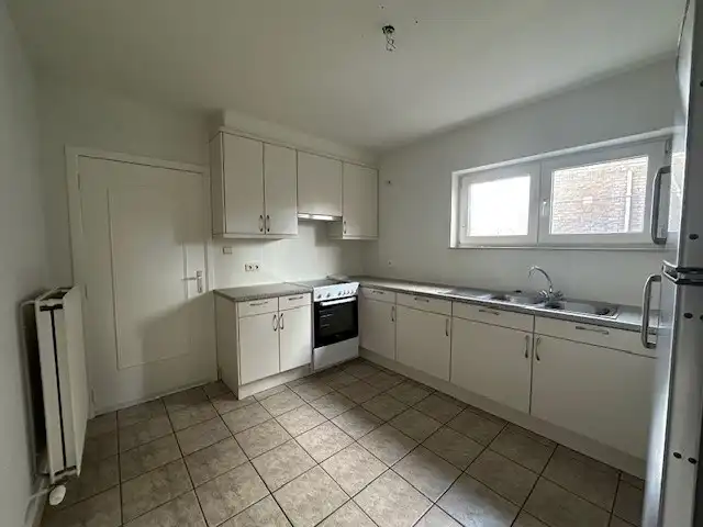 Een nette, comfortabele  gezinswoning met 3 slaapkamers, garage en tuin. foto 6