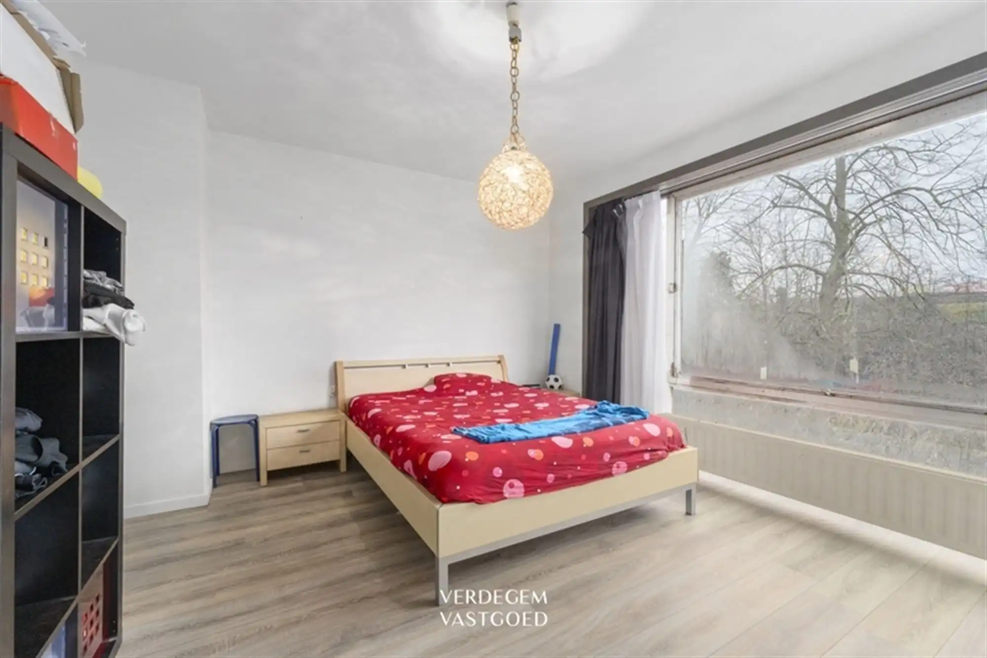 Ruime woning met 5 slaapkamers, zuidwestgerichte tuin en inpandige garage met oprit in een rustige straat foto 14