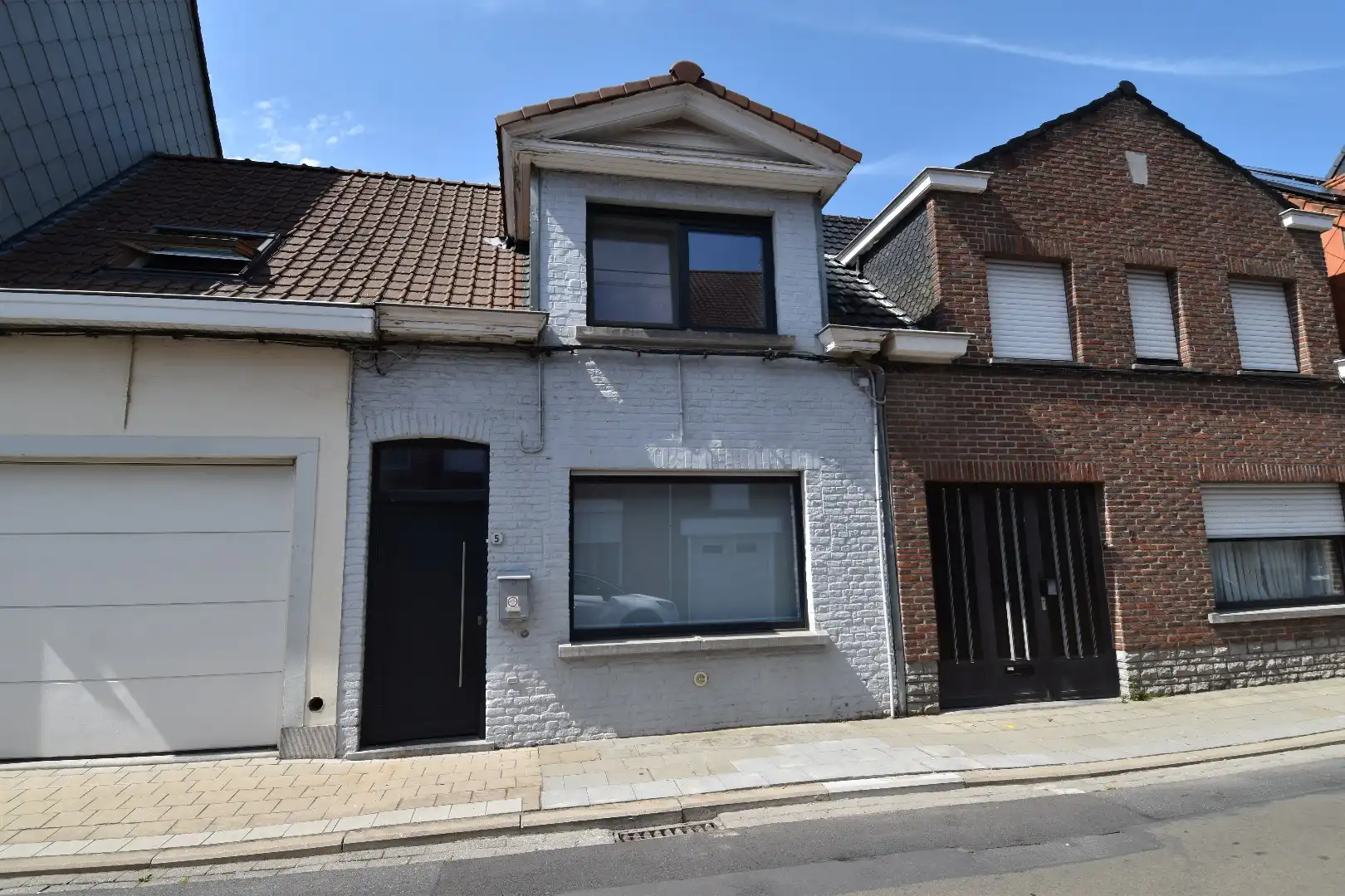 Gezellige gezinswoning te Wevelgem met vlotte bereikbaarheid foto {{pictureIndex}}