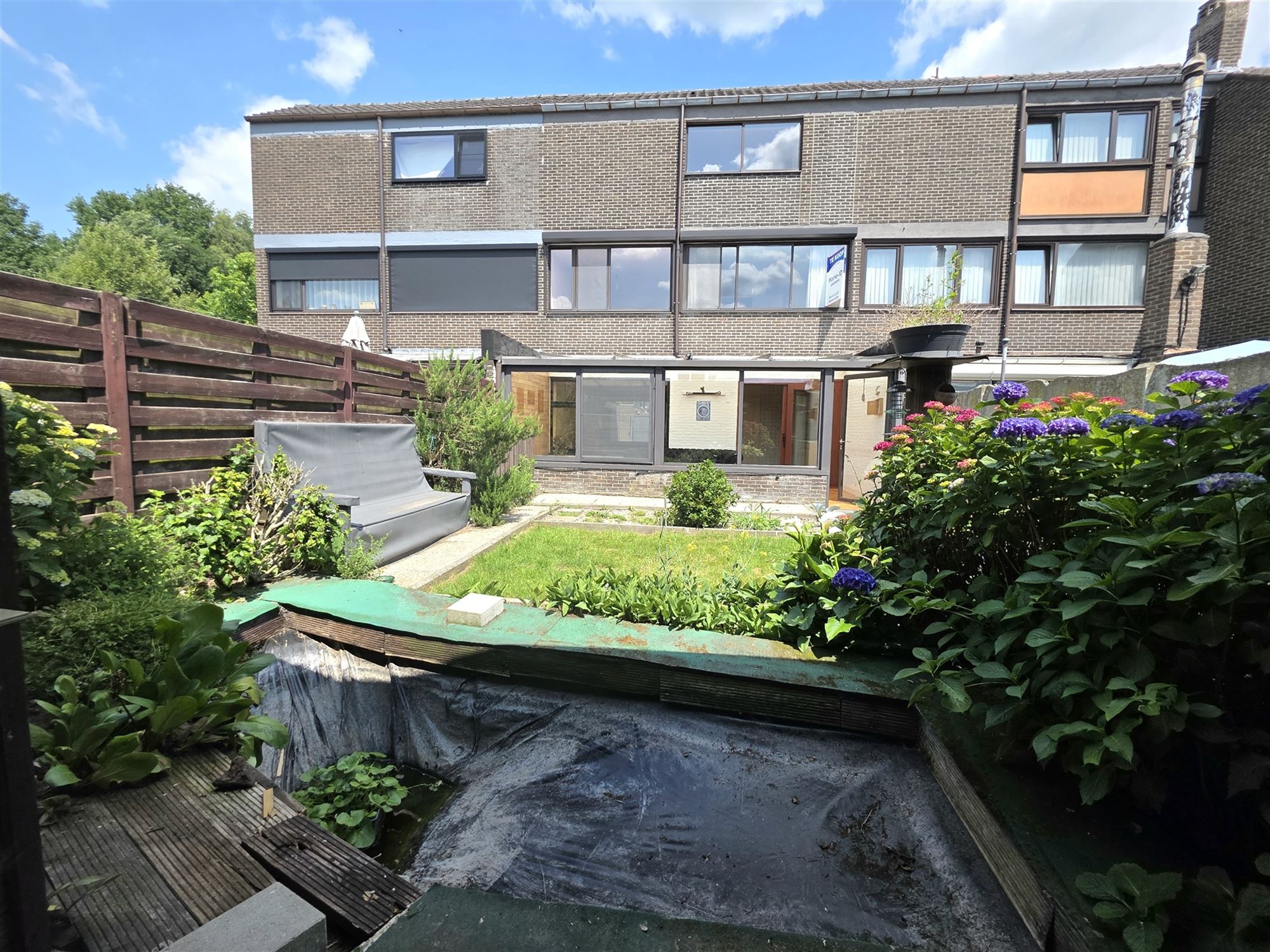 Knappe gezinswoning met 4 à 5 slpks, garage en tuin foto 11