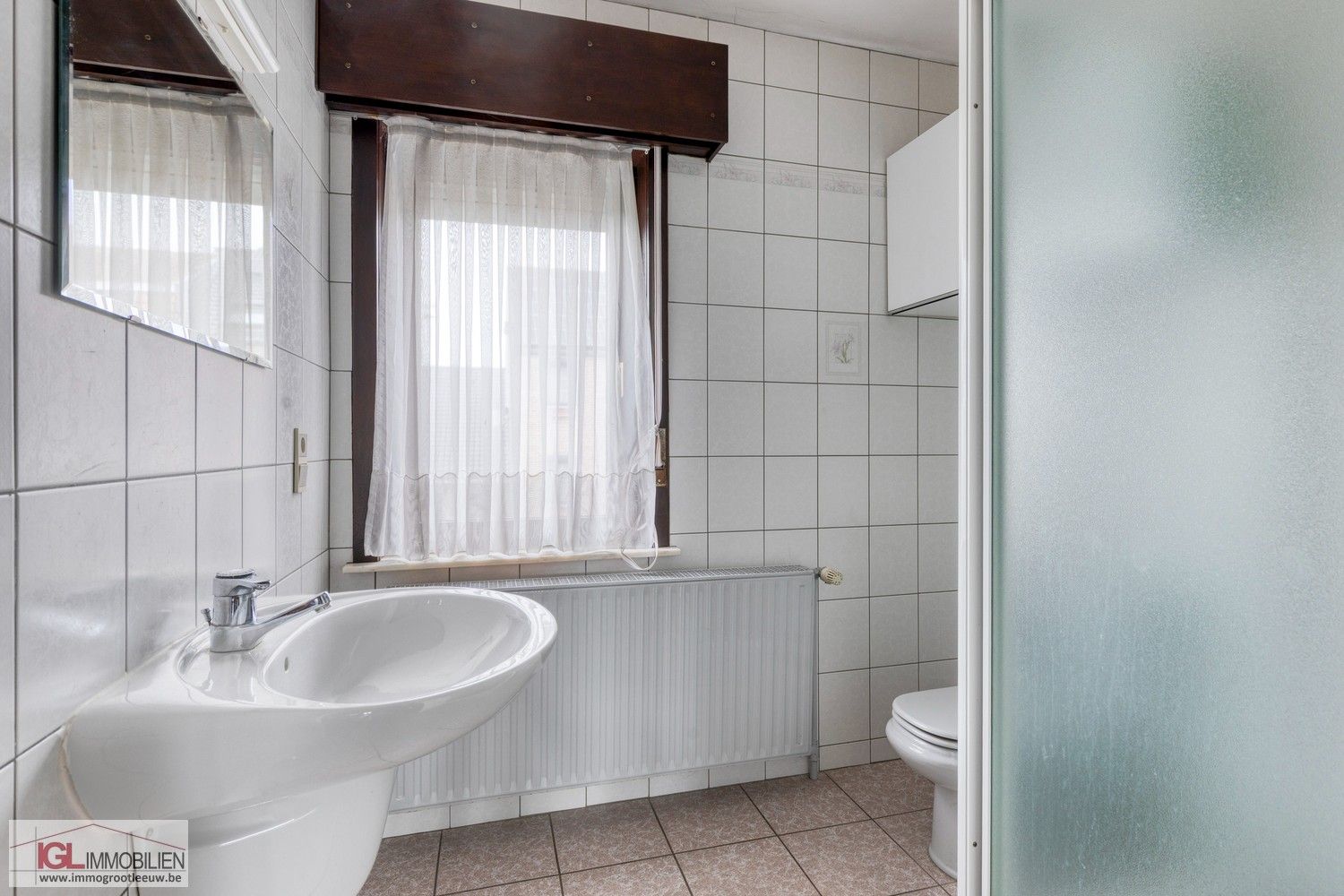 Rustig gelegen driegevelwoning met zonnige tuin & extra uitbreidingsmogelijkheden foto 12