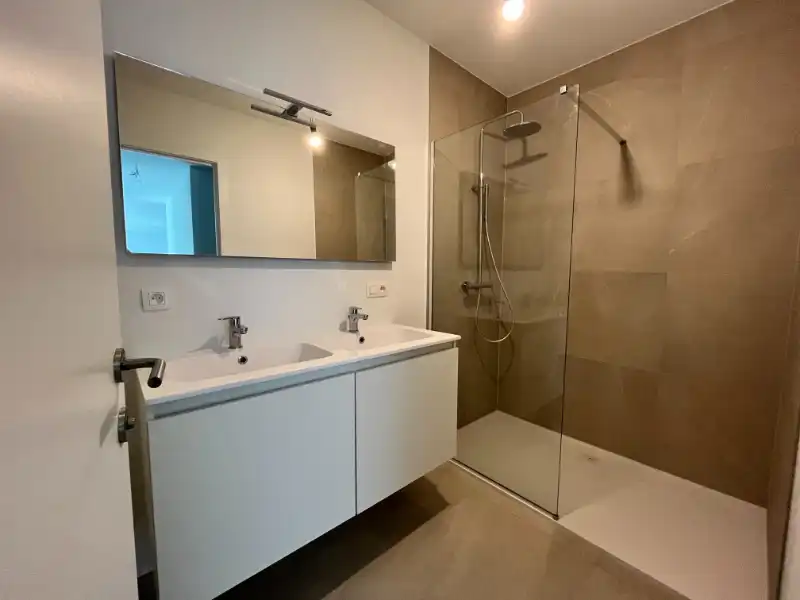 App met 2  slpkm, garage en kelderberging foto 13