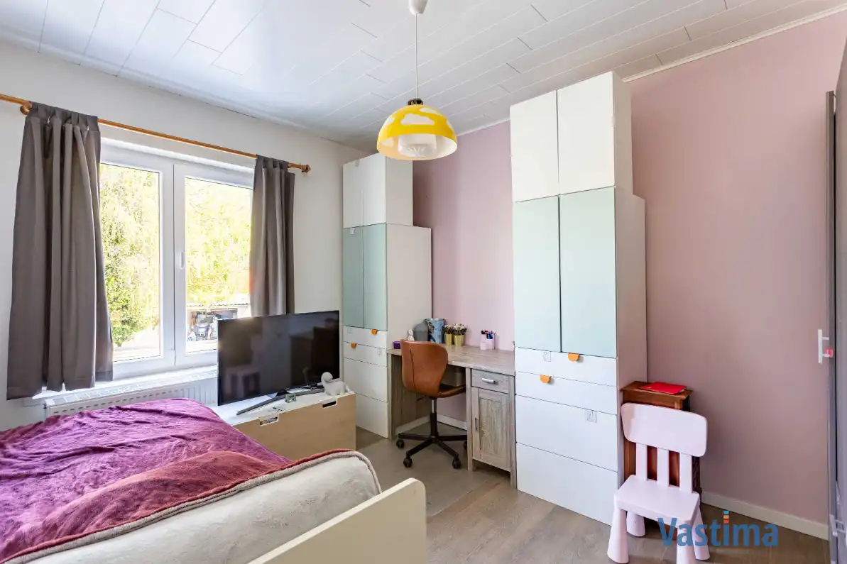 Energiezuinige en instapklare starterswoning met 2 slaapkamers in hartje Erembodegem foto 14