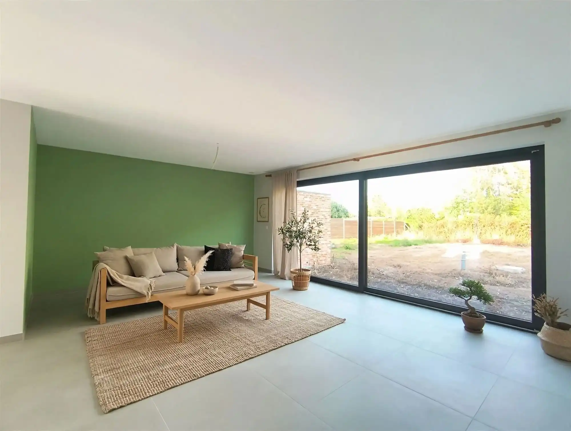 Gloednieuw wooncomfort in deze woning met 3 slaapkamers, terras, tuin en carport. foto 6