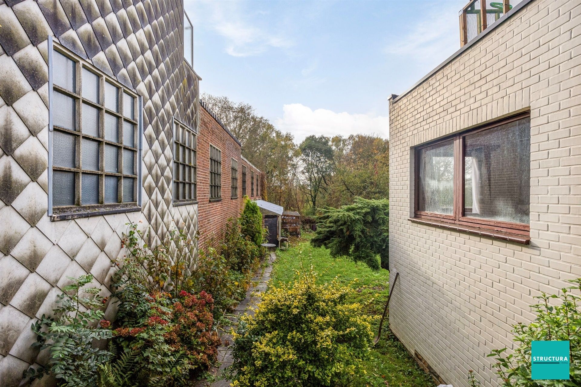 Gelijkvloers appartement met tuin, kelders en zonnepanelen foto 11