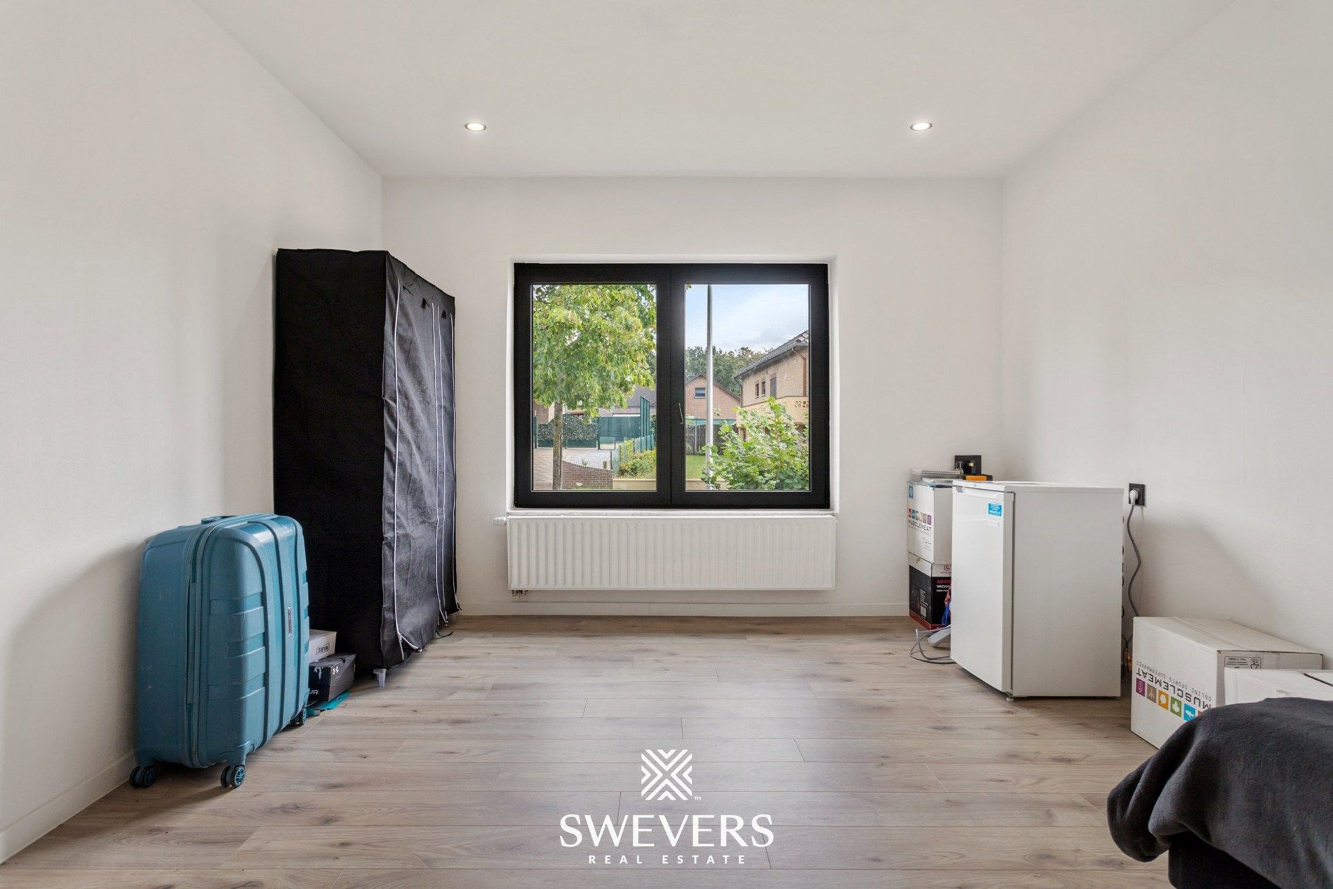 Volledig gerenoveerde gezinswoning met garage en tuin te Genk foto 17