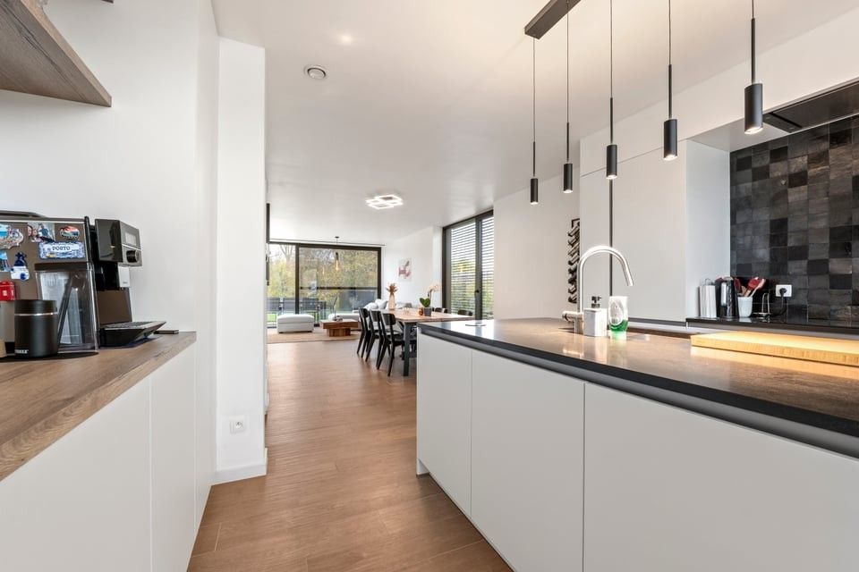 MODERNE HALFOPEN BEBOUWING MET INPANDIGE GARAGE EN RUIME TUIN IN SINT-TRUIDEN foto 10