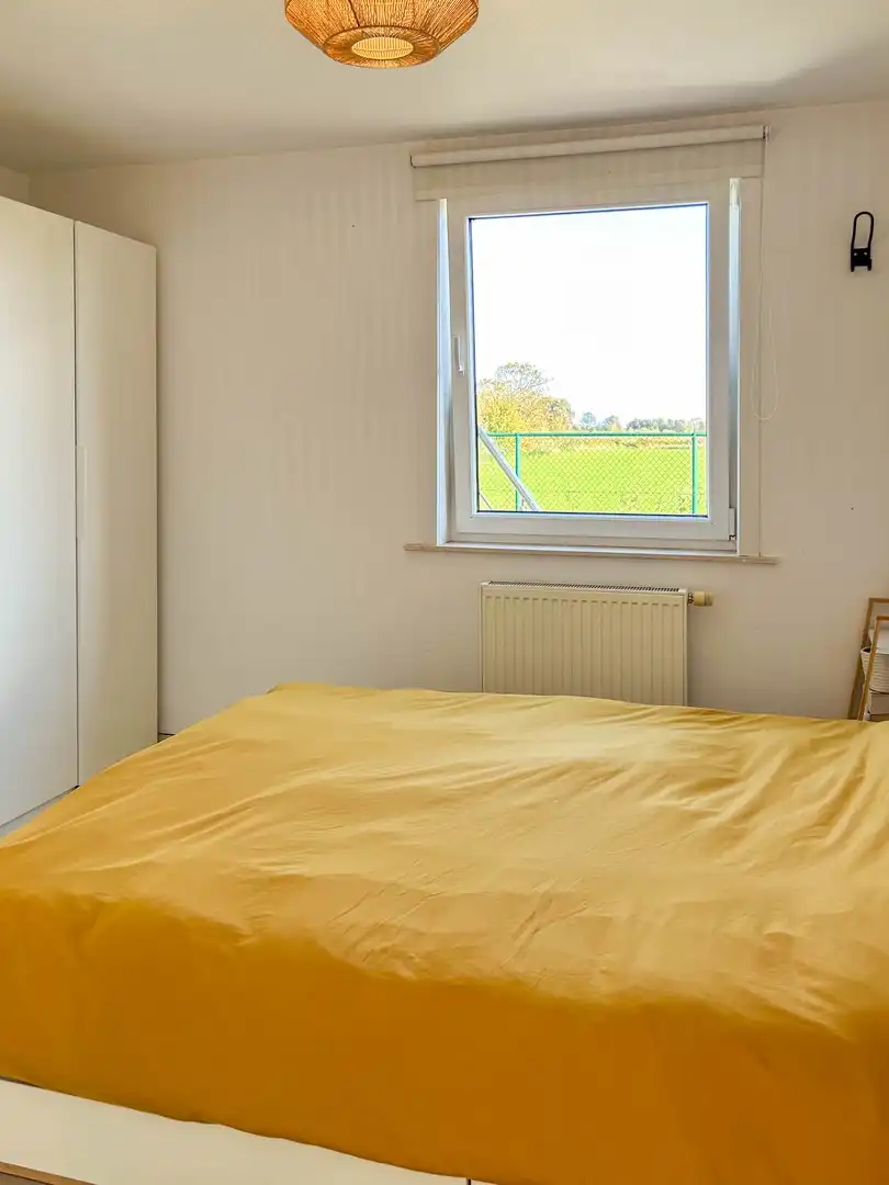 Ruime koppelwoning met waanzinnig zicht over spaarbekken en EPC A foto 10