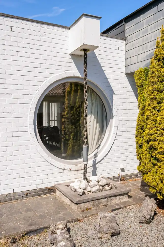 Architecturale gelijkvloerse open woning met inpandige garage op toplocatie nabij het centrum van Lochristi! foto 4