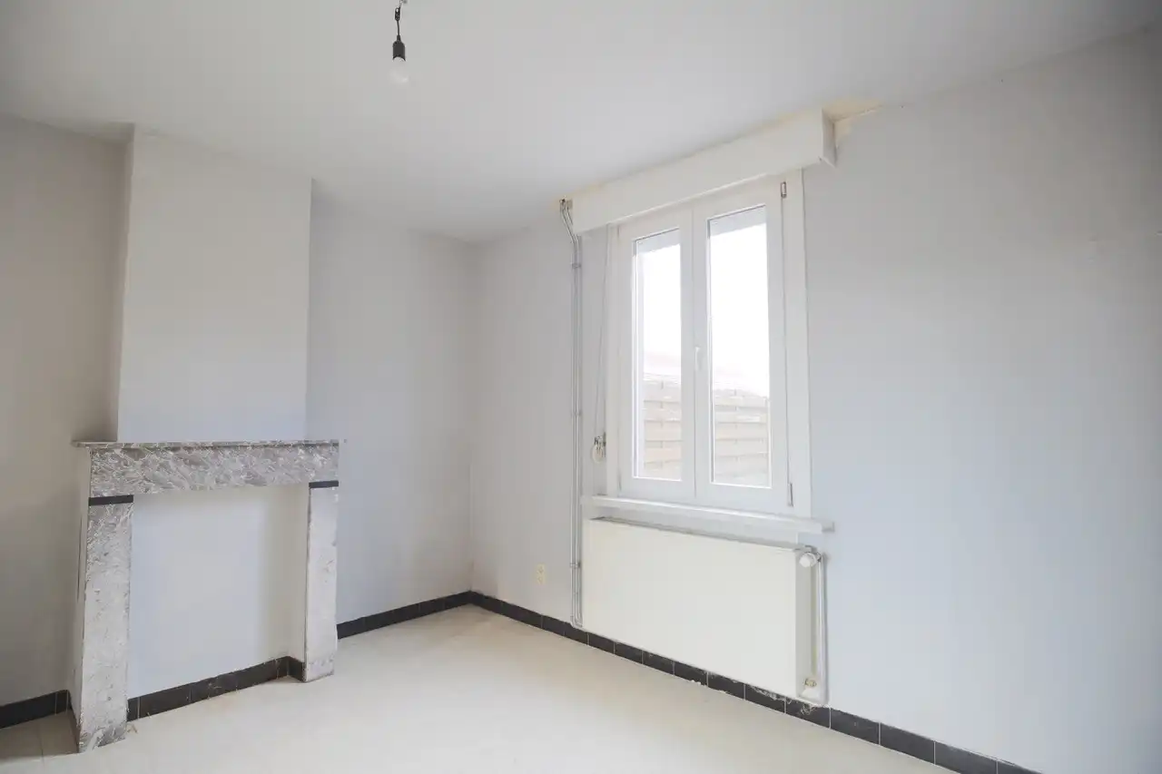 Rijwoning met terras en tuin foto 3