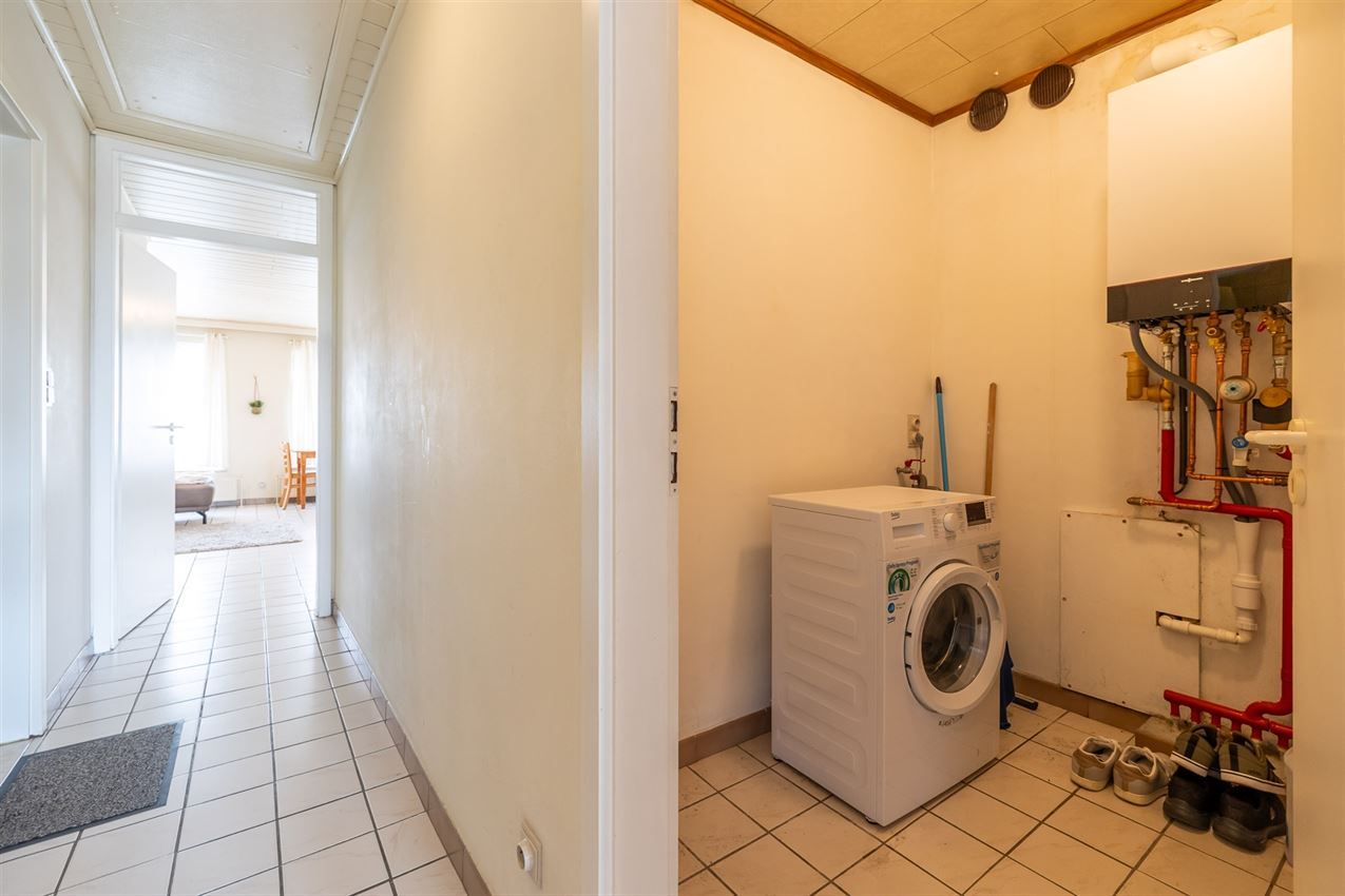 Verzorgd gebouw met handelszaak en 2 apt foto 38
