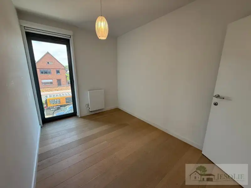 Tiptop verzorgd 2 slpk appartement met groot terras foto 13