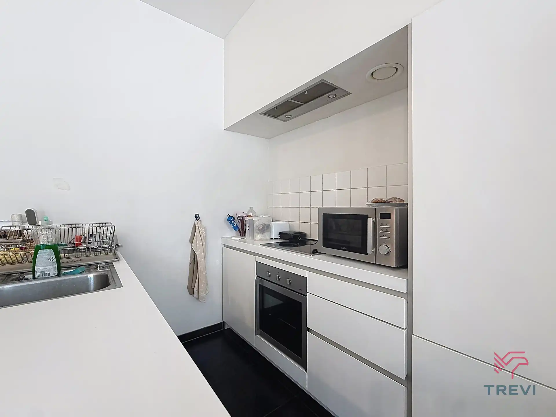 Mooie 3-kamerwoning van ± 113 m² met kelder en parkeerplaats foto 3