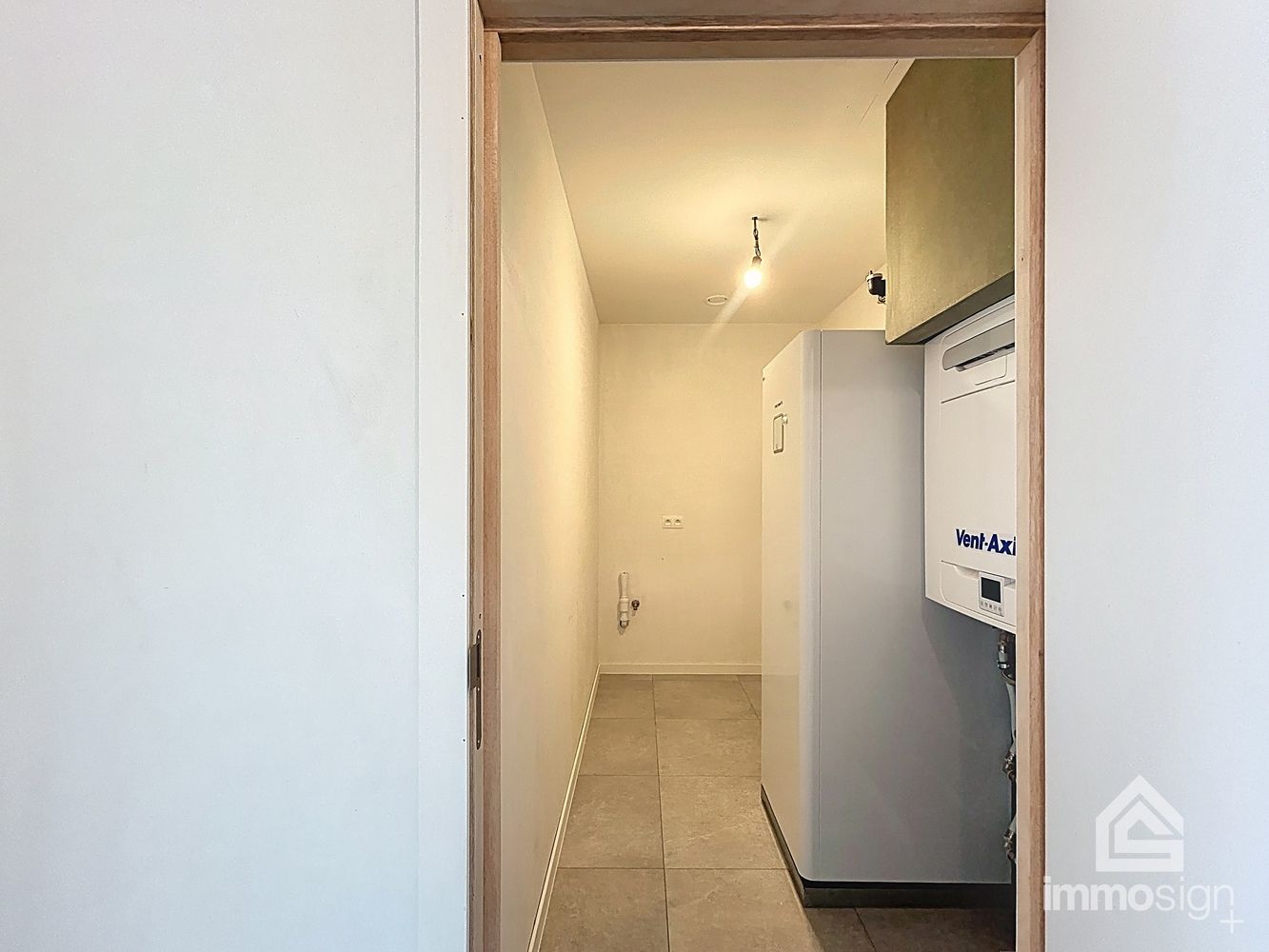 Instapklaar nieuwbouwappartement met 2 slaapkamers, terras en autostaanplaats te Kinrooi foto 14