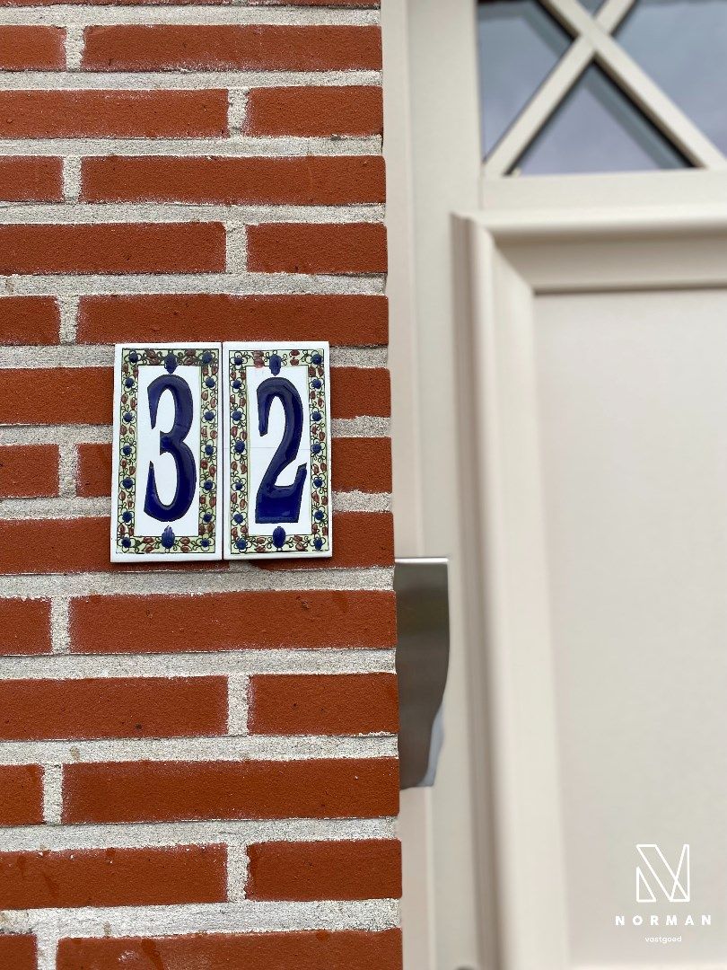 Instapklare woning met grote garage en uitweg in Harelbeke! foto 2