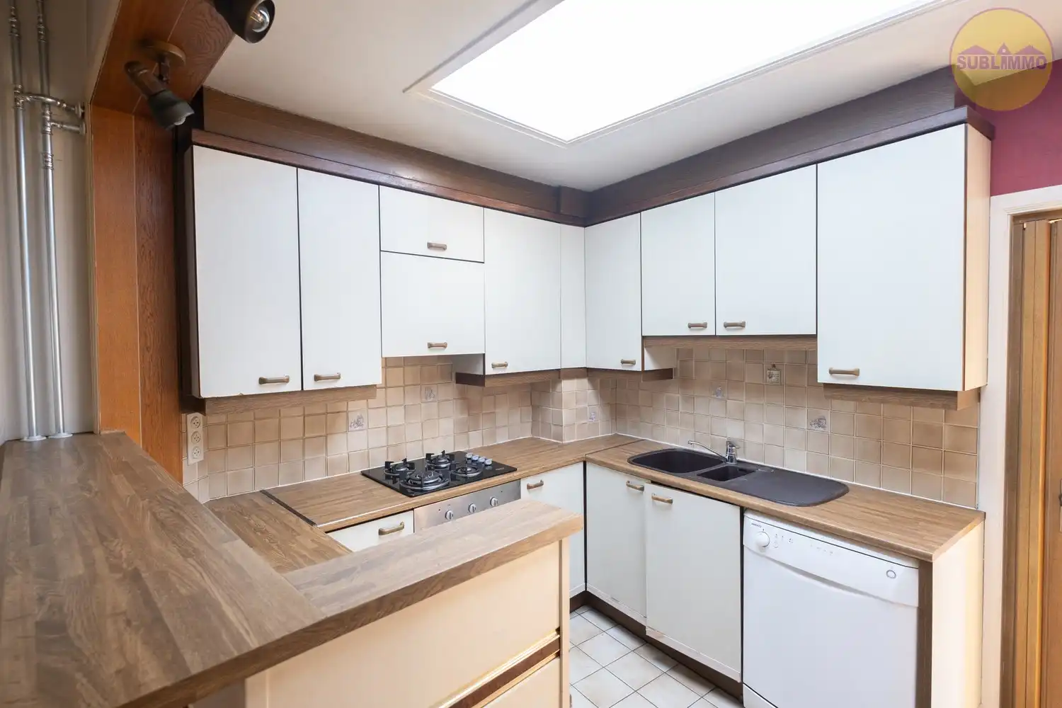 Uniek renovatie- en investeringspand met garage en tuin in hart van Meerhout foto 5