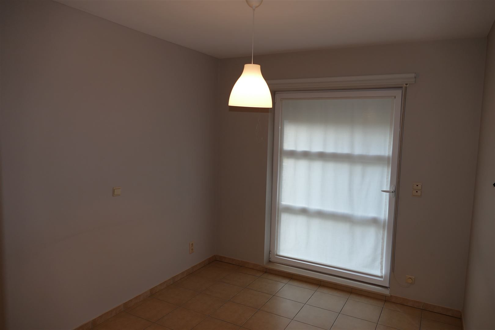 Gelijkvloers appartement met terras en garage foto 10