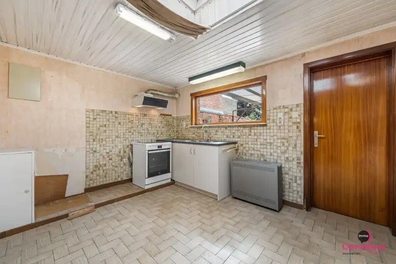 Te renoveren rijwoning op centrale ligging met leuke zuidgerichte tuin foto 9