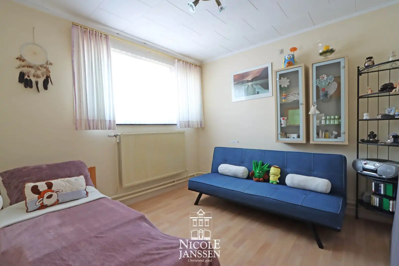 Halfopen gezinswoning met 4 slaapkamers, garage en tuintje foto 21