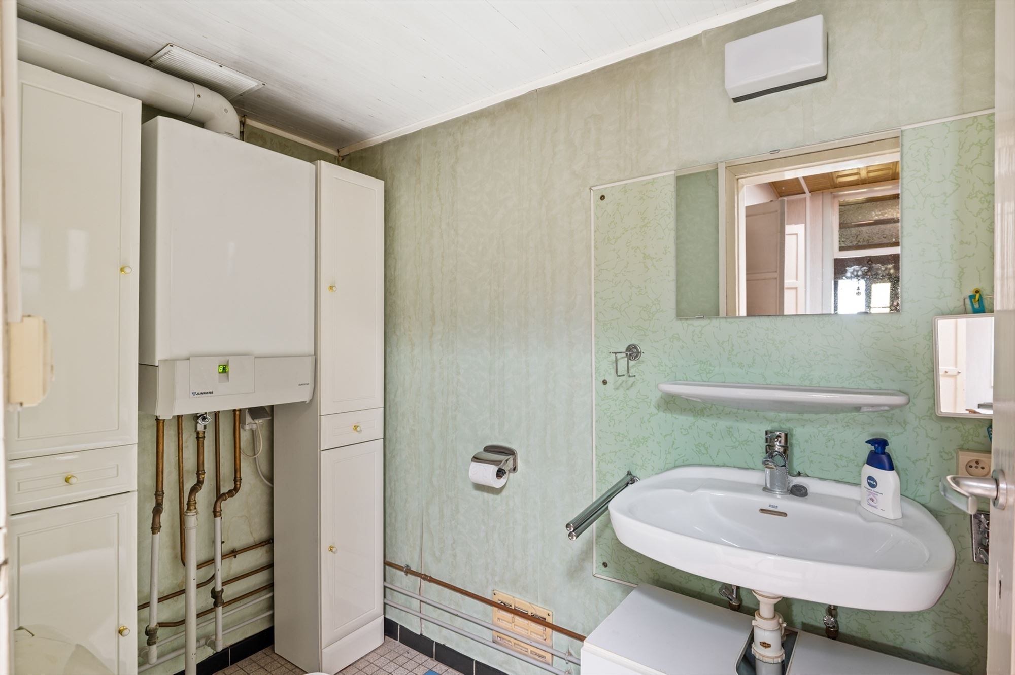 Te moderniseren woning te Duffel-Oost foto 9