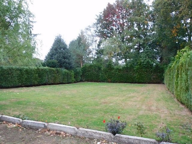 Gelijkvloers appartement met garage foto 12