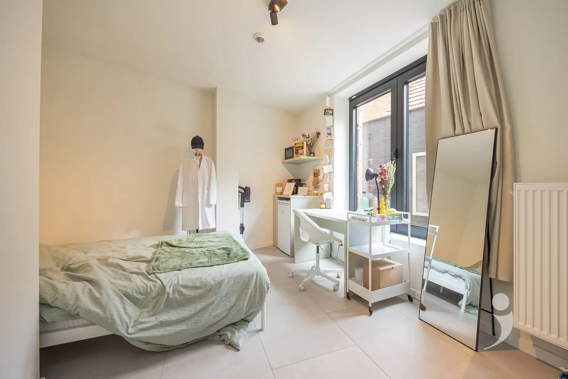 Opbrengsteigendom met 21 kamers en 1 studio foto 13