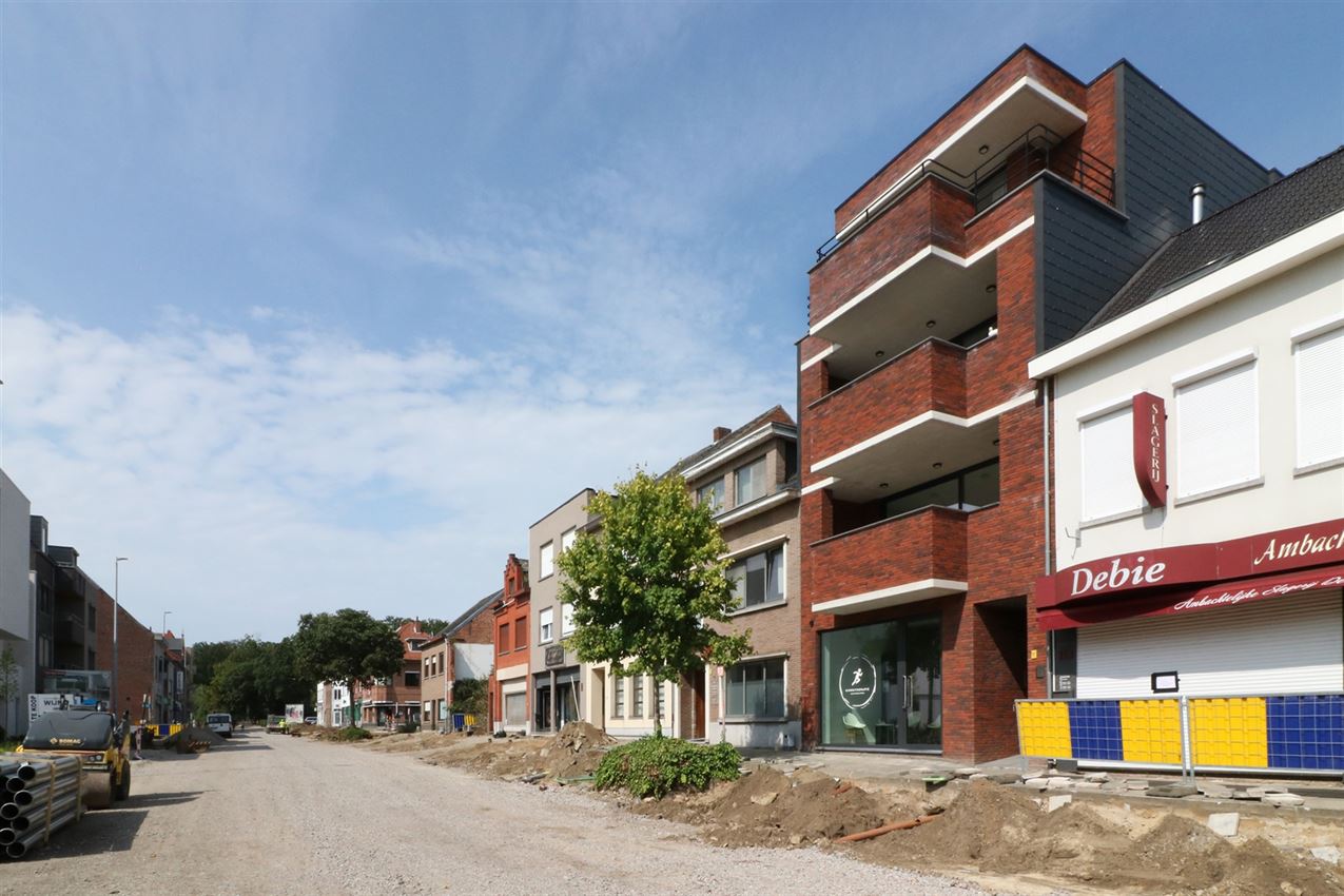 Nieuwbouwapp. met 2 slpk., terras en parking in centrum Averbode foto {{pictureIndex}}