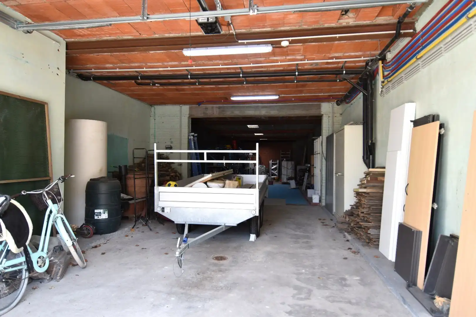 Opslagruimte van 144 m² met recent vernieuwd duplexappartement  foto 2